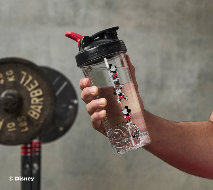 pro-series-a9 Mickey_Mouse_Protein_Shaker_Bottle_Being_Held_In_the_Gym.jpg